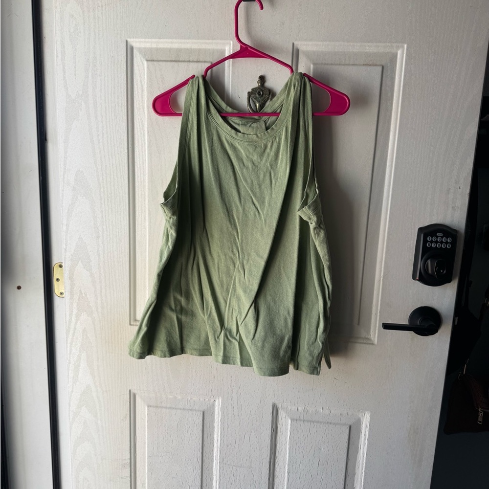 Maurice’s green tank top